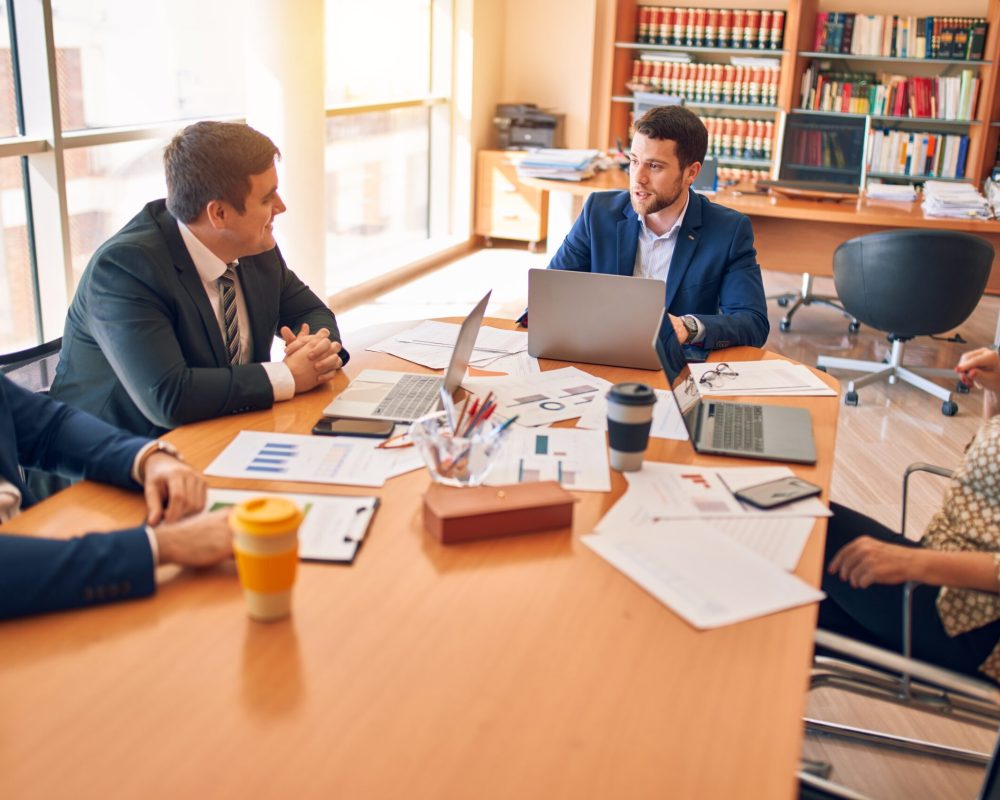 Business lawyers workers meeting at law firm office. Professional executive partners working on finance strategry at the workplace